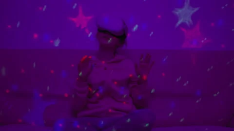Girl Using Virtual Reality Headset And Looking Around At Interactive Techno.. Stock Footage 346084234
