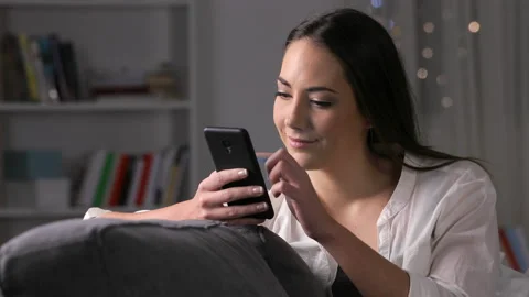 Girl using voice recognition on phone to record a message Stock Footage 102493954
