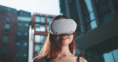 A girl using vr headset in the business district Stock Footage 201679452