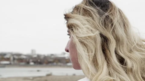 Girl view back side white shirt on frost wind northern city. Cold winter river. Stock Footage 132949988