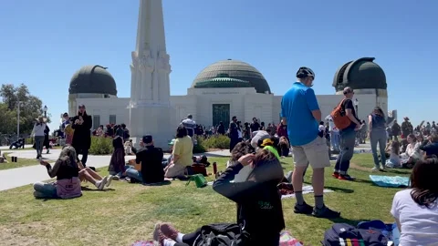 Girl Views Solar Eclipse with Safety Glasses at Griffith Observatory Stock Footage 271312959