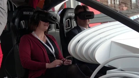 Girl in virtual glasses headset testing Vodafone 5G-based communications systems Stock Footage 74112570