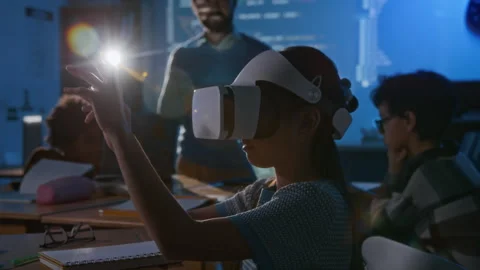 Girl in VR Headset Manipulating Code Blocks in Metaverse at Programming Lesson Stock Footage 307065972