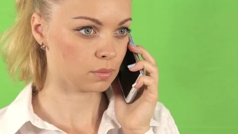 The girl is waiting for the reply of the interlocutor Stock Footage 78483836