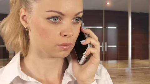 The girl is waiting for the reply of the interlocutor Stock Footage 78483850