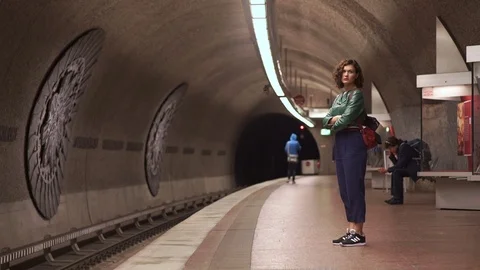 The girl is waiting for the train. Stock Footage 79102235