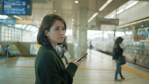 Girl is waiting the train Stock Footage 98167341