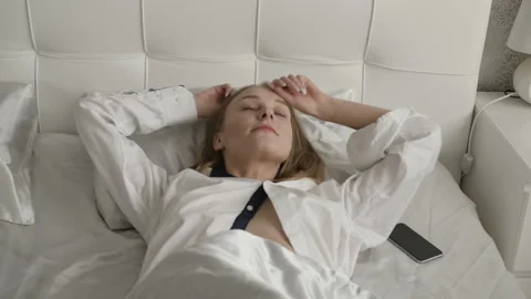Girl is waking up to stretch Stock Footage 88167545