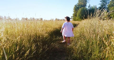 Girl walking alone Stock Footage 110277310