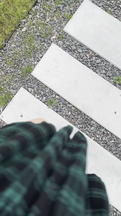 Girl walking along the path Stock Footage 280437428