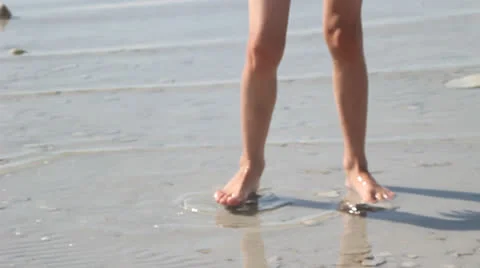 Girl walking on beach Stock Footage 27076835