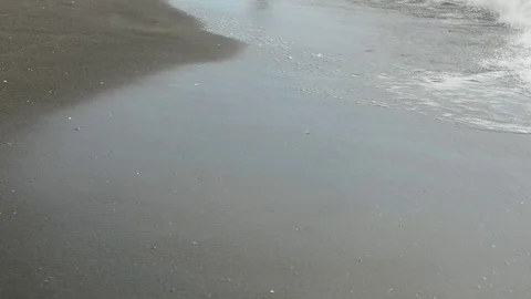 Girl walking on the beach Stock Footage