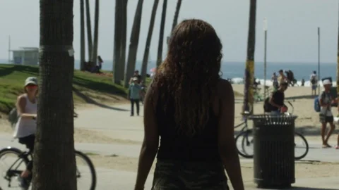 Girl Walking at Beach Stock Footage 125963861