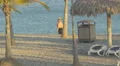 Girl walking on the beach of Playa Blanca Resort in Panama 4k or 4k+ Resolution
