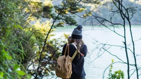 Girl Walking by Lake Foto stock