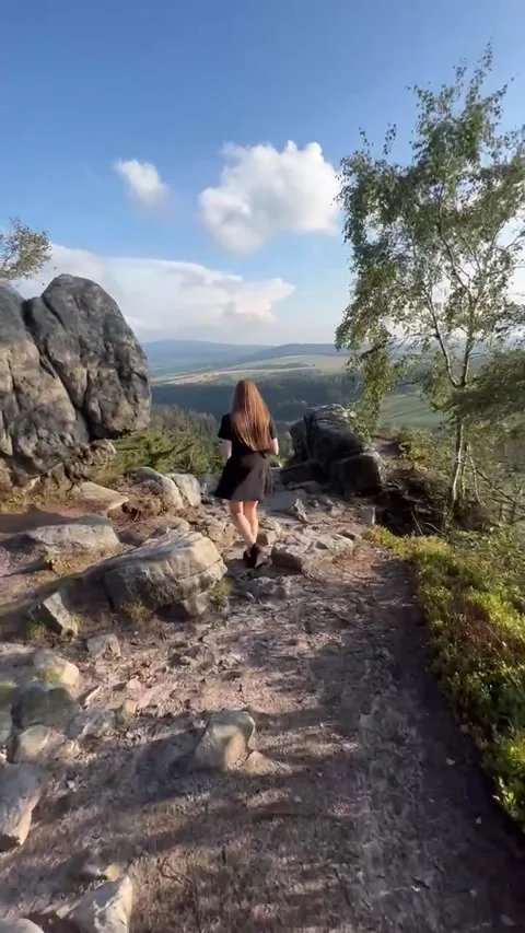 The girl is walking on the mountain. Stock Footage 224722527