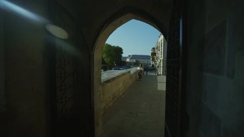 Girl walking in old city Stock Footage 90756653