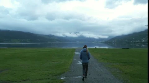Girl walking on path  Stock-Footage 252257497
