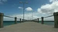 Girl walking on quay 20110423 153539b HD Footage
