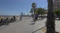 Girl walking on the seafront in Barcelona 4k or 4k+ Resolution