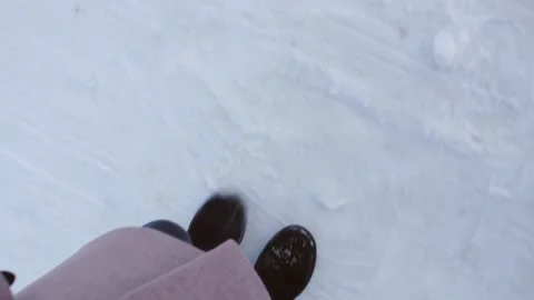 Girl walking on the snow Stock Footage 101342201