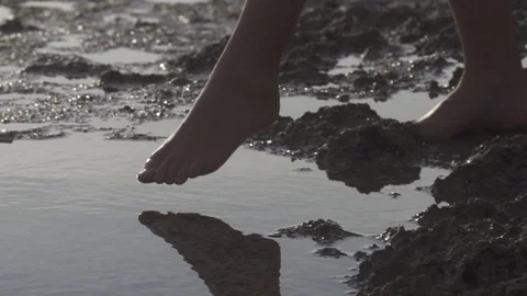Girl Walking Through Reflective Pool Slow Motion Stock Footage 106782875