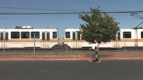 Girl walking by the train Stock-Footage 11352620