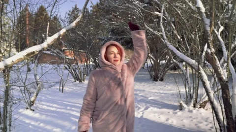The girl is walking in the winter forest Stock Footage 146925575