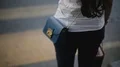 Girl walking on zebra, attentively crossing road in city, successful purchase HD Footage