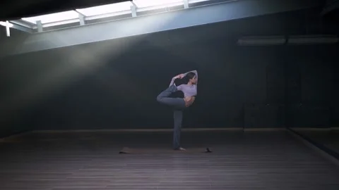 Girl wants to achieve mental balance through physical balance Stock Footage