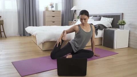 Girl watching online training tutorial on laptop Stock Footage 158104352
