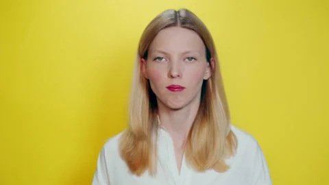 Girl waves head, without pretext, you can do everything. Motivates for action Stock Footage 131064451