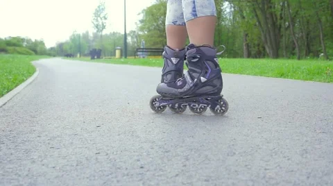 Girl wearing rollers. She is rollerskating. Video stock 63394938