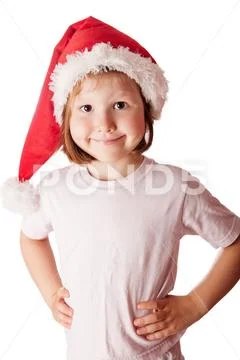 Girl wearing Santa hat Stock Photos