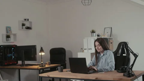 Girl web studio designer working on a laptop Video stock 197432971