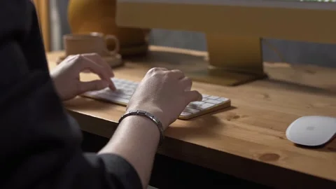 Girl website developer typing on the keyboard at the computer in the office. Stock Footage 223140752