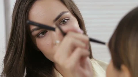 Girl by which do a make-up Stock-Footage 93574077