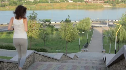 A girl while jogging in park Stock Footage 66504195