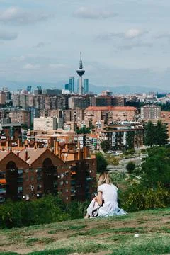 Girl in white dress enjoying Madrid view from Siete Tetas Park Stock Photos