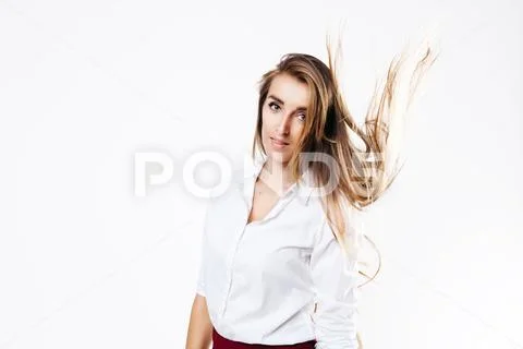 Girl in white shirt and burgundy skirt on an isolated white background Stock Photos