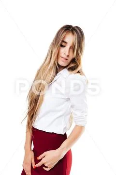 Girl in white shirt and burgundy skirt on an isolated white background Stock Photos