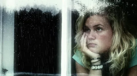 Girl in window Stock Footage 2537423