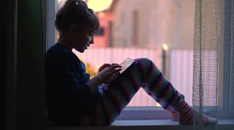 Girl at the window Stock Footage 46856761