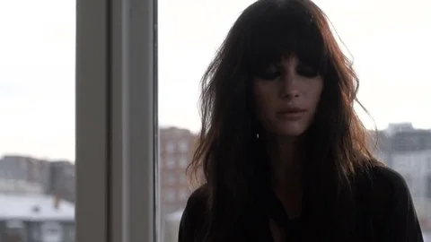 The girl at the window Stock Footage 72623509