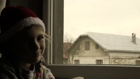 Girl by the window Stock Footage 142594913
