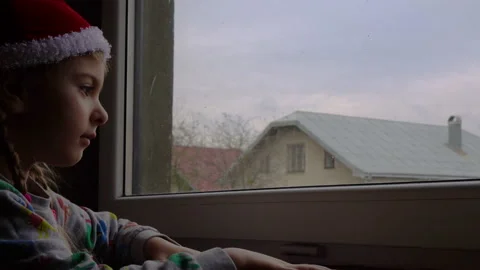 Girl by the window Stock Footage 142594922