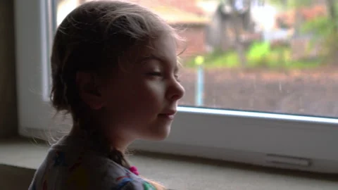 Girl by the window Stock Footage 142603211