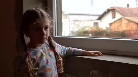 Girl by the window Stock Footage 142603242