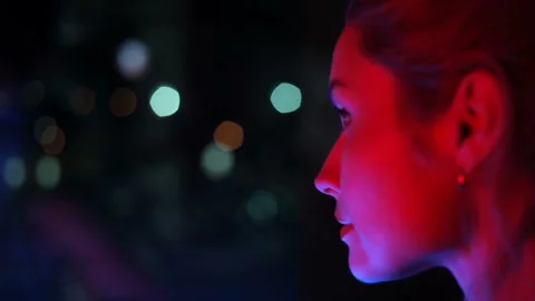 The girl at the window watching. Video stock 94922352