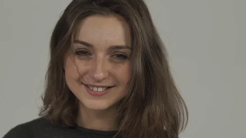 The girl winks at the camera Видео 81457952